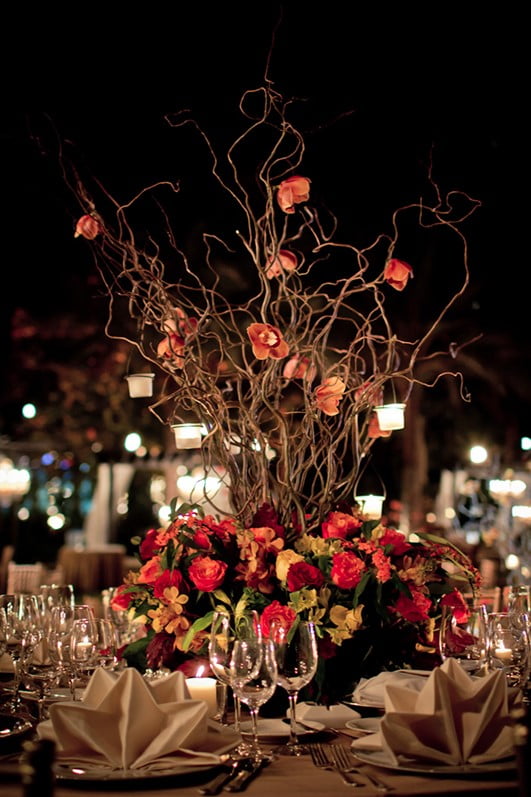 Table decorated with flowers and wine glasses for Wedding cocktail hour